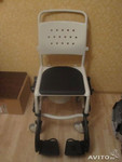 Инвалидное кресло с санитарным оснащением.