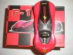 Мобильный телефон в виде Ferrari F1.