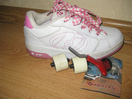 Продам роликовые кроссовки фирмы Heelys
