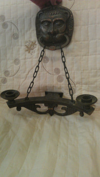 Два подсвечника с головой льва и цепями