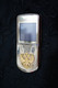 Сотовый Nokia 8800 Sirocco Gold с гербом России.