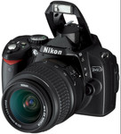 Зеркальный фотоаппарат Nikon D40 Kit в упаковке.