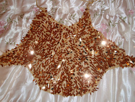 Топ с золотыми паетками.