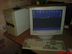 Компьютер в комплекте с монитором, мышью и клавиатурой