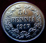 Редкая, серебряная монета 50 пенни 1917 года (б/короны).