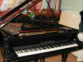 продаю после полной реставрации чёрный рояль "Шрёдер", длина 215