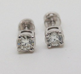 Серьги-гвоздики с бриллиантами 0.56 карат.