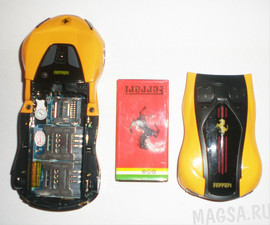 Мобильный телефон в виде Ferrari F1. 4