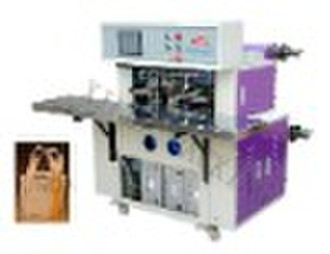 Non-woven handle loop fixing machine