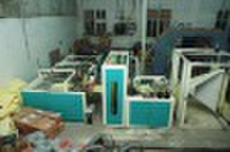 Nonwoven bag cutting and sewing machine