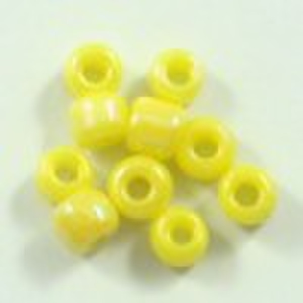 opaque colours lustered yellow glass bead