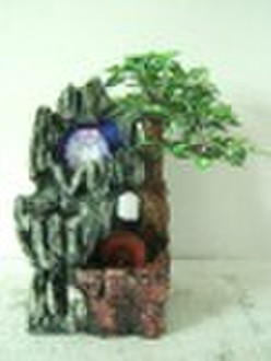 Brunnen mit grünem Blatt