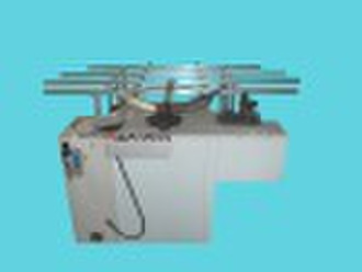 Horizontal spiral wound gasket machine
