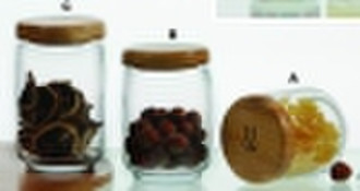 Glass storage jar with wooden lid