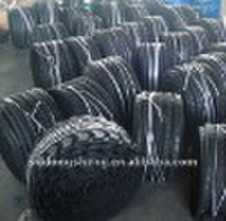 Refurbished tire tread with glue