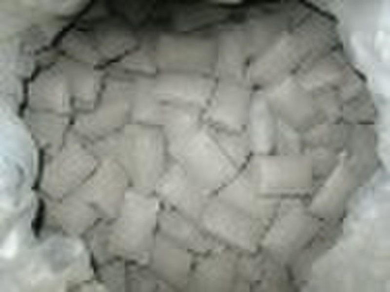 Manganese metal briquette for alloy