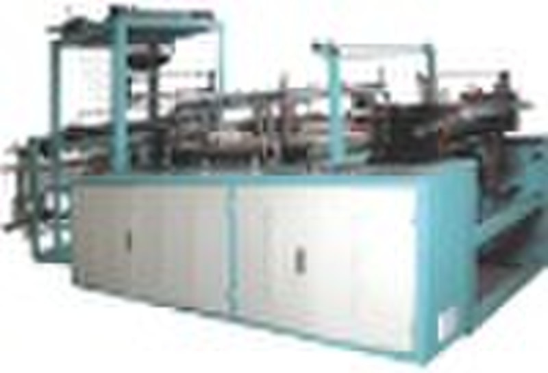 Plastic glove making machine