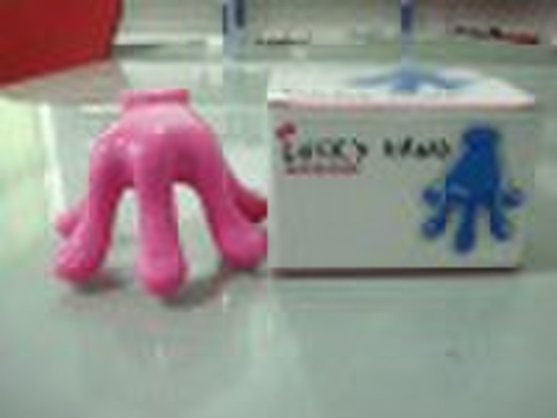 mini electronic massager in hand shape