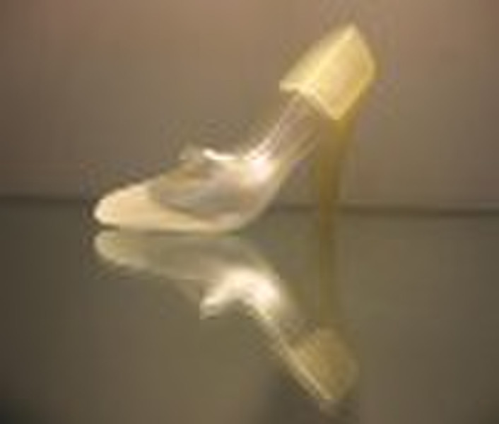 High-heeled shoes shaped perfume bottle