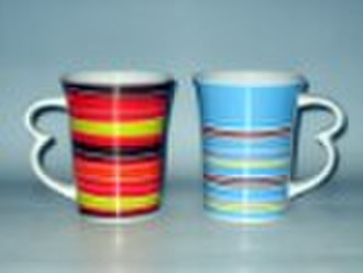 Mug with ear shape handle with decal
