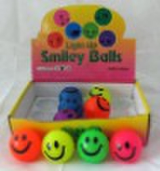 Flashing bouncing ball with smile face