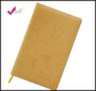 Yellow color leather notebook