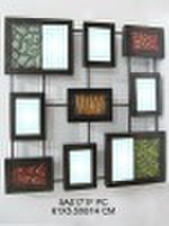 metal wall decor with small mirror