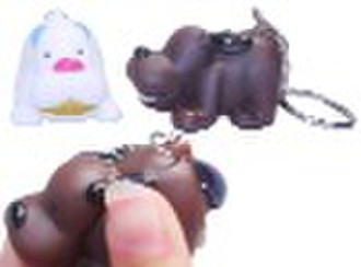 funny squeeze shitting dog keychain