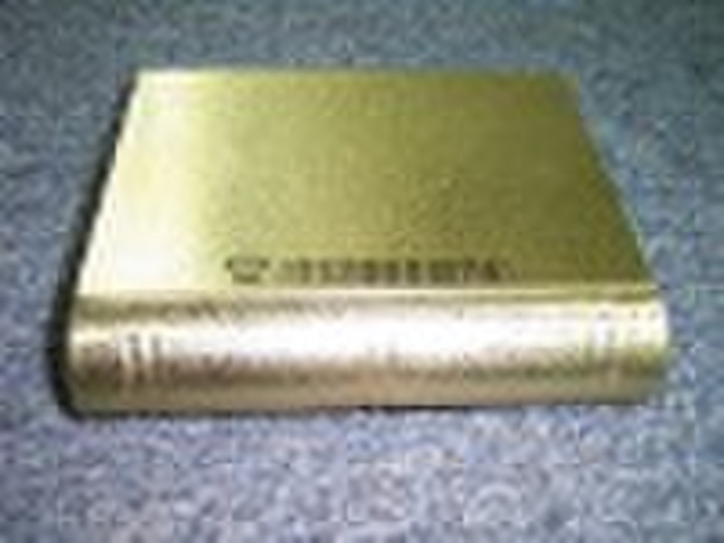 gold book-shaped tinbox