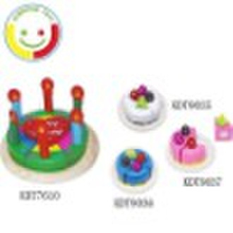 Деревянные игрушки играют еда -birthday торт