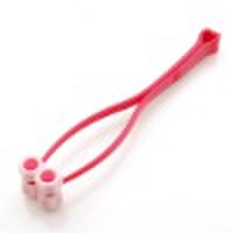 plastic face massager