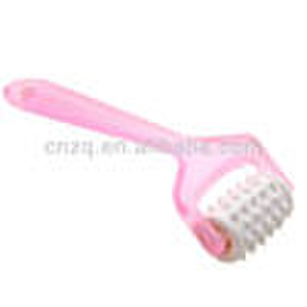 plastic handheld face massager