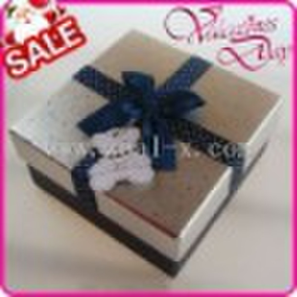 cardboard gift box with cross ribbon