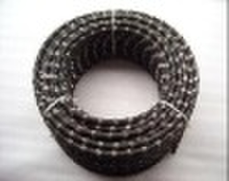 Rubberized diamond wire saw for granite quarrying