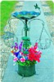 Bird feeder,bird bath,flower pot and plant