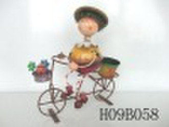 Metal figurine on bicycle with planter(garden orna