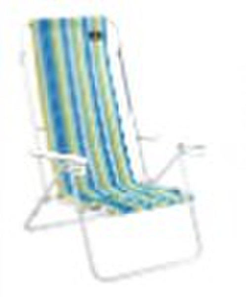 Folding beach chair with adjustable armrest