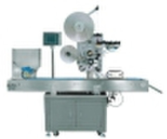 Vertical labeling machine